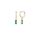 Gold huggie hoop earrings with a green emerald-cut cubic zirconia drop, in 18k gold plating.