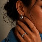 Arden Ring in a silver-tone finish with an emerald-cut cubic zirconia stone in a bezel setting, adjustable ring from Zoé Jewelry.