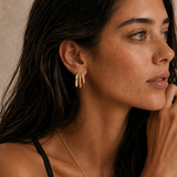  Model wearing the Blaire Layered Hoops — triple-row 18K gold hoops with smooth, twisted rope, and pavé CZ rows — Zoé Jewelry