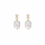 Chloé Pearl Earrings — gold drop earrings with a baguette CZ and a baroque pearl, shown as a pair, from Zoé Jewelry.
