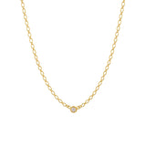 Halo necklace with single bezel-set CZ stone on an oval-link gold chain