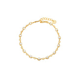 Maisie Bracelet — 18K gold-plated wave-link bracelet set with round cubic zirconia and a Zoé disc tag, from Zoé Jewelry.
