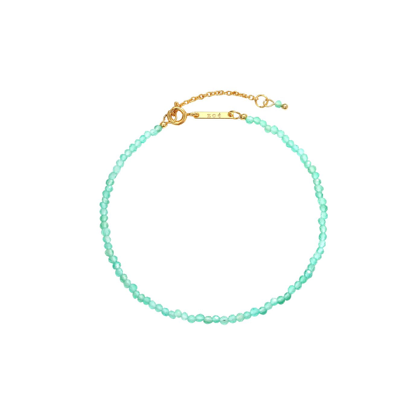 Marisol Bracelet — a dainty strand of faceted natural green gemstone beads on an 18K gold-plated chain with a Zoé bar tag, from Zoé Jewelry.