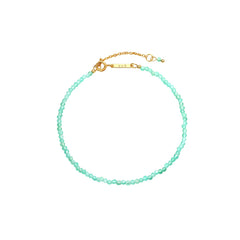 Marisol Bracelet — a dainty strand of faceted natural green gemstone beads on an 18K gold-plated chain with a Zoé bar tag, from Zoé Jewelry.