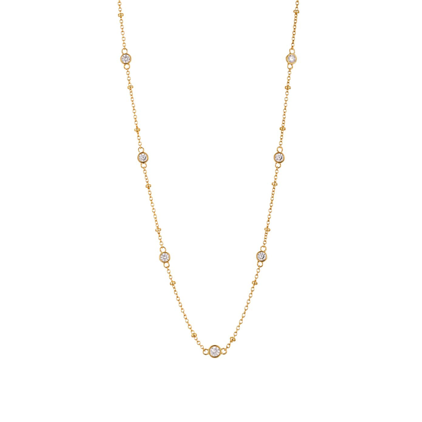 Stellar CZ station necklace with seven bezel-set stones on a beaded gold chain