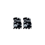 Thea Mini Clips in Monochrome Marble — a set of two black and white marbled acetate claw clips from Zoé Jewelry.