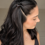 Model wearing two Thea Mini Clips in Coco Swirl in a half-up style — warm brown swirled acetate claw clips from Zoé Jewelry.