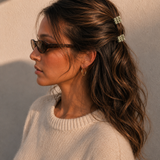 Model wearing two Thea Mini Clips in Olive Checkerboard in a half-up style — olive green checkerboard acetate claw clips from Zoé Jewelry.