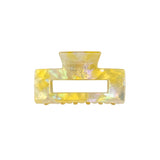 Victoria large rectangular claw clip in Citrus iridescent yellow pearl cellulose acetate