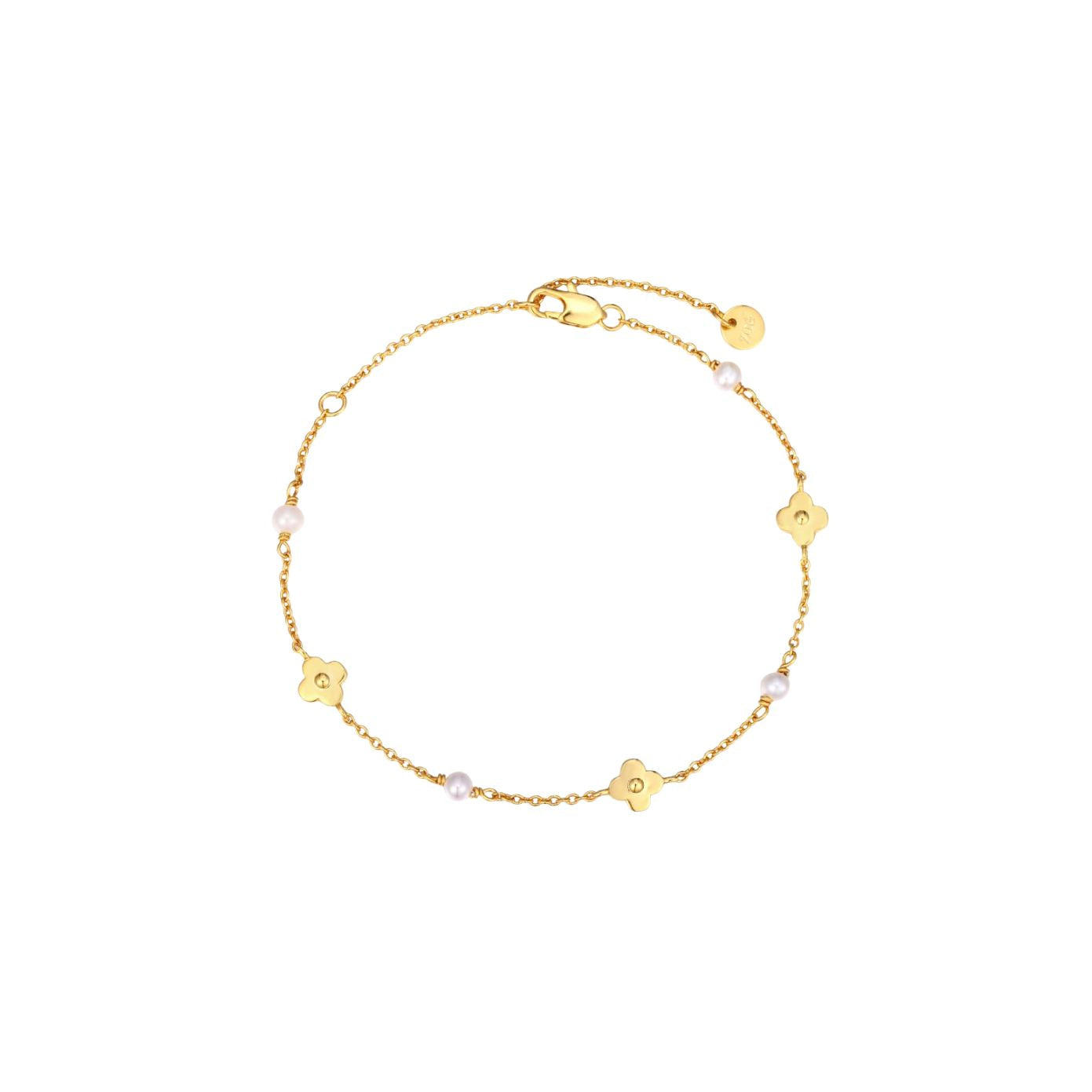 Dainty gold chain bracelet with four-petal flower stations and pearl accents, lobster clasp, adjustable extender, and Zoé disc tag, in 18k gold plating.
