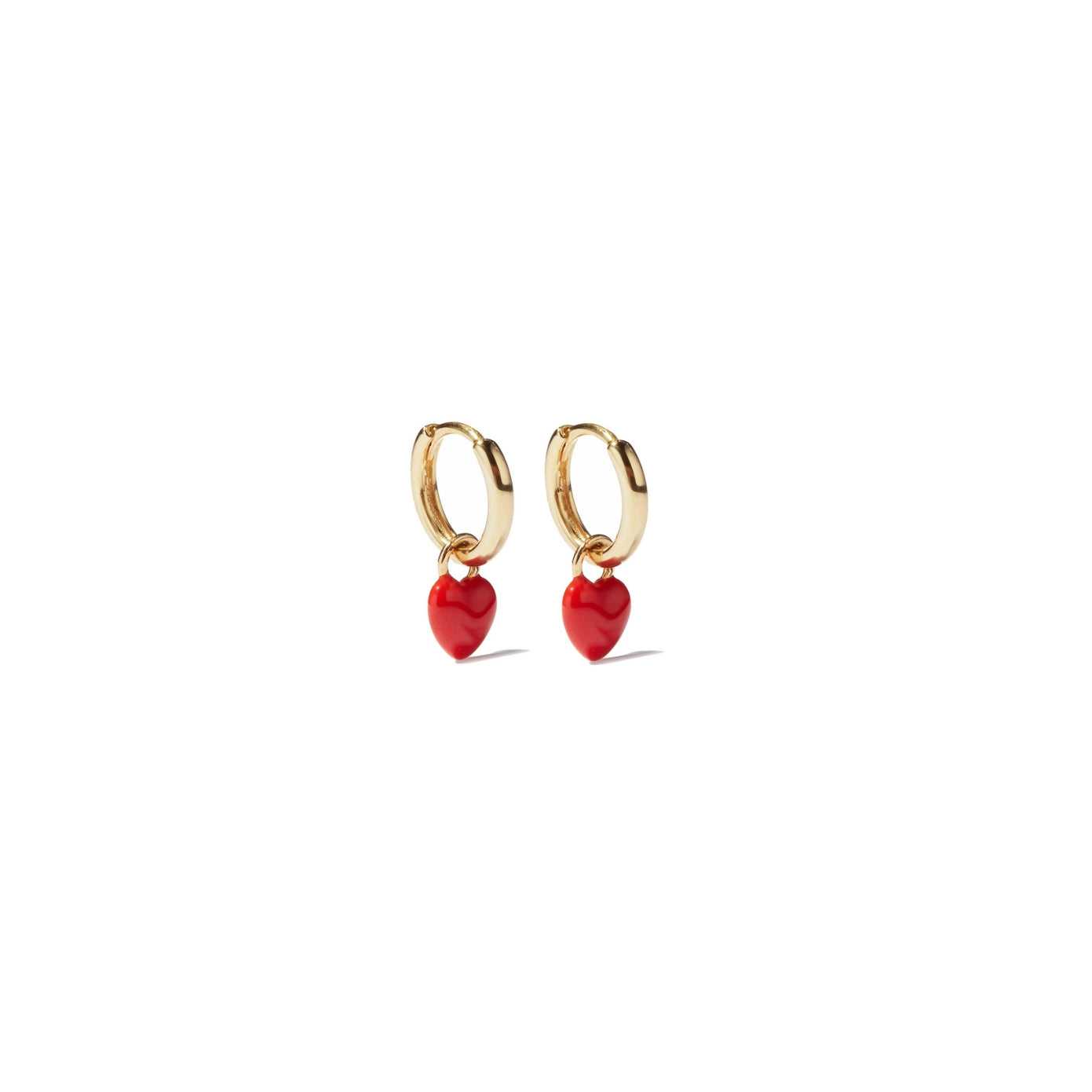 Gold huggie hoop earrings with a red enamel heart charm, in 18k gold plating.