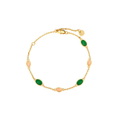 Dainty gold cable chain bracelet with green and pink oval cabochon stations, lobster clasp, adjustable extender, and Zoé disc tag, 18k gold plating.