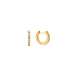 Gold pavé cubic zirconia huggie hoop earrings with a hinged closure, in 18k gold plating.