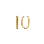 Elongated oval gold hoop earrings with a smooth high-polish finish and hinged closure, in 18k gold plating.