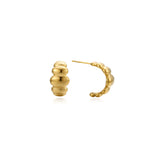Chunky gold C-hoop earrings with a ribbed, stacked-dome texture in 18k gold-plated stainless steel, on posts.
