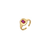 Bold gold open adjustable signet ring with a red emerald-cut cubic zirconia centre, 18k gold plating.
