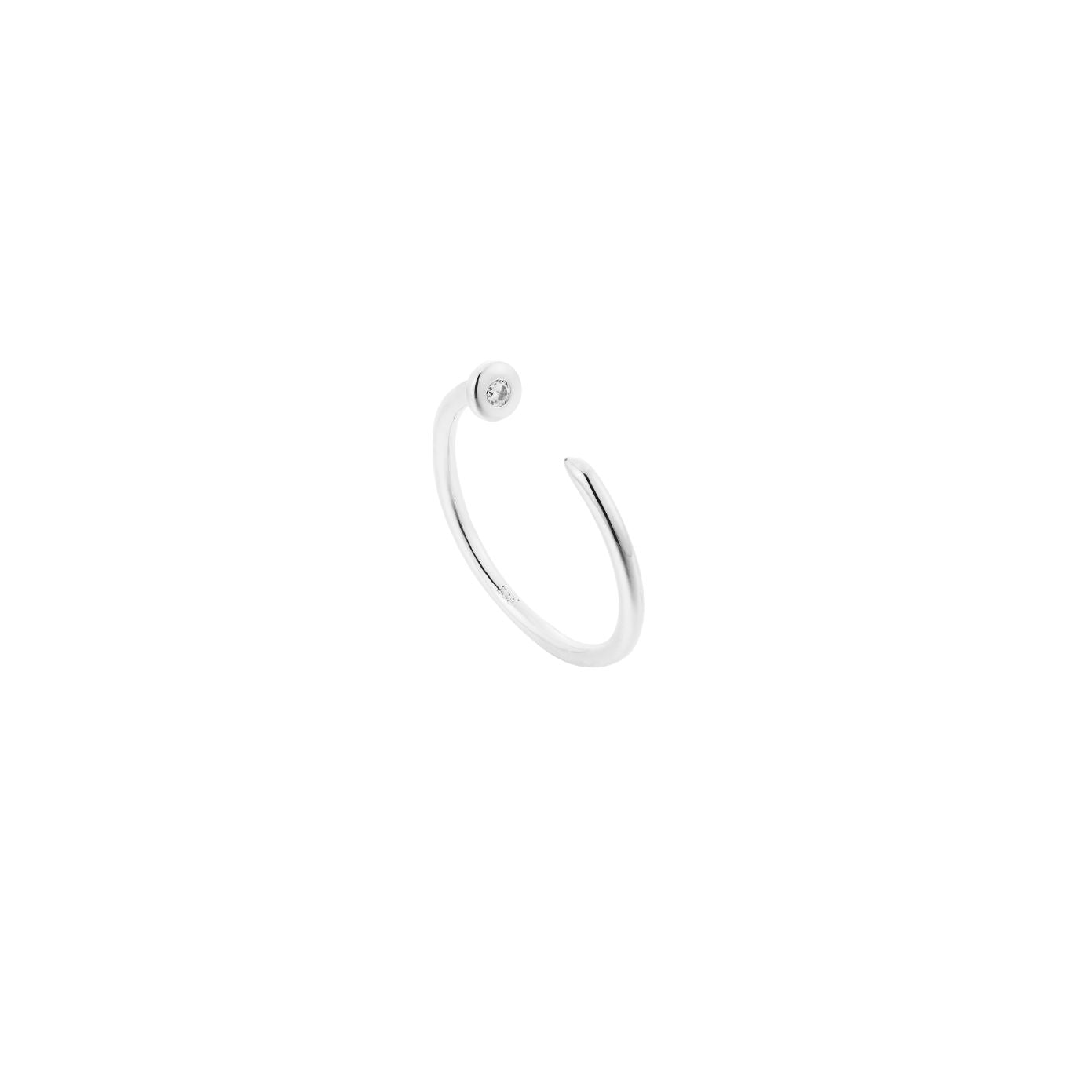 Minimal silver nail-style open cuff ring with a single clear cubic zirconia, adjustable, stainless steel.