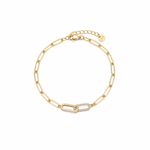 Gold paperclip chain bracelet with a cubic zirconia pavé centre link, lobster clasp, adjustable extender, and Zoé disc tag, in 18k gold plating.