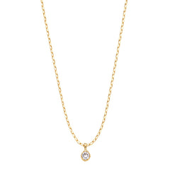 Gold paperclip chain necklace with a round clear cubic zirconia solitaire pendant in an organic bezel, lobster clasp, adjustable extender, and Zoé disc tag, in 18k gold plating.