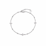 Dainty silver-tone beaded chain bracelet with three cubic zirconia four-petal flower stations, lobster clasp, adjustable extender, and Zoé disc tag.